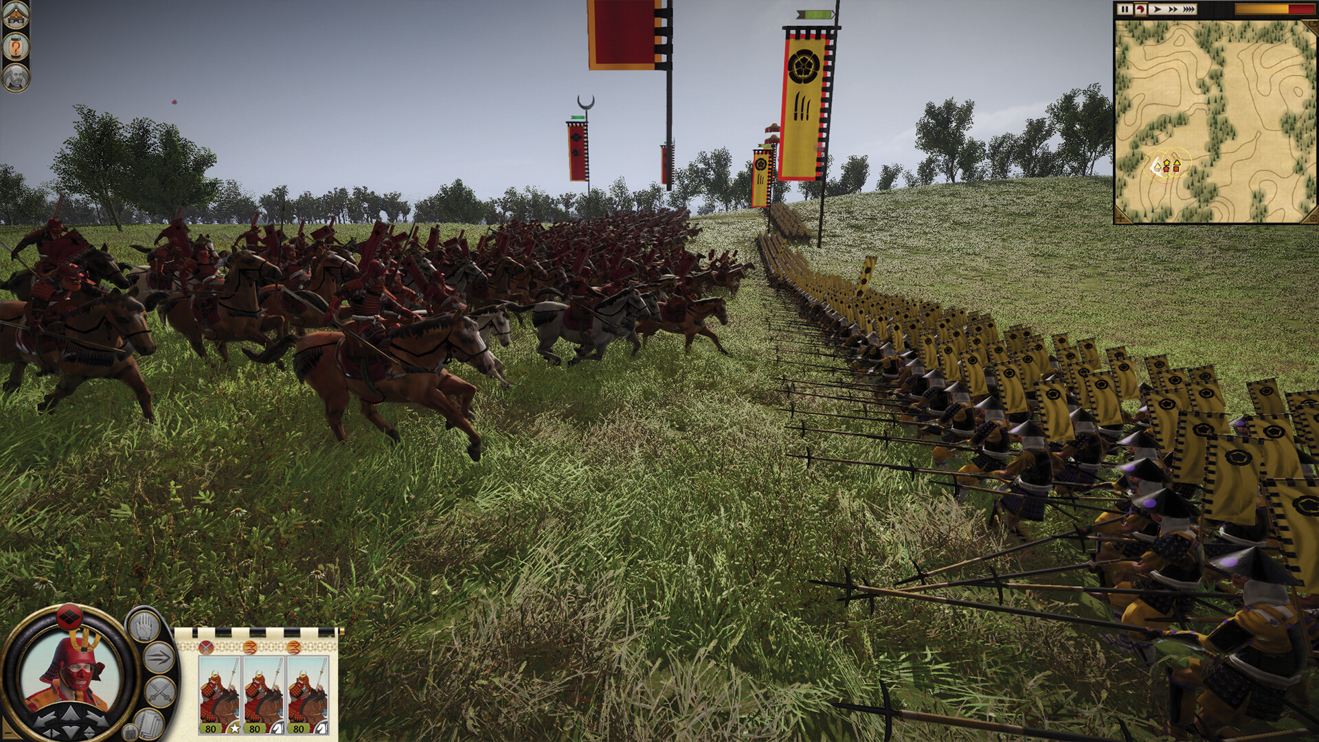 Steam screenshot of a cavalry charge in red armor closing on a long line of spearmen carrying yellow banners.